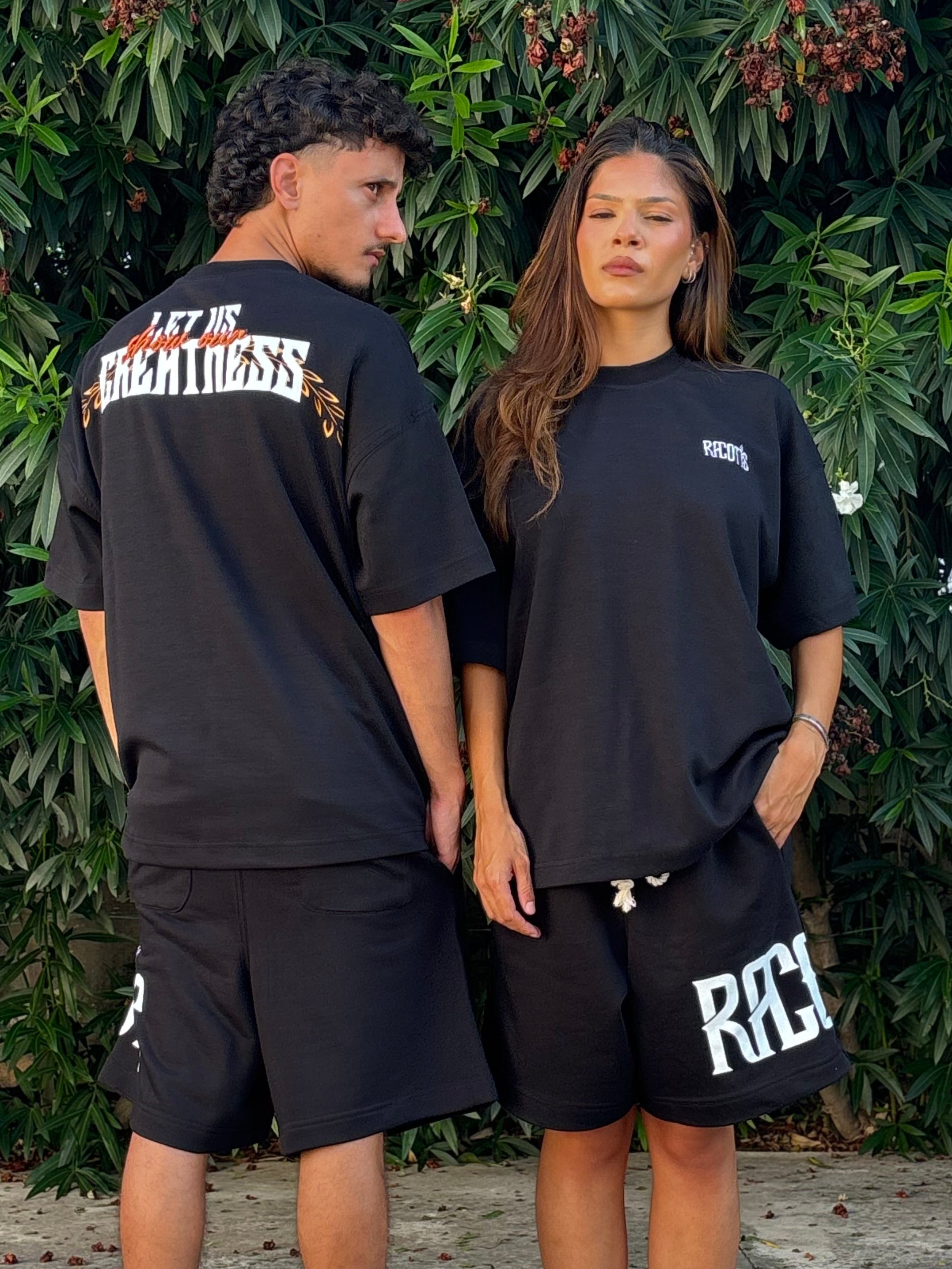 Black "Let Us Show Our Greatness" T-Shirt